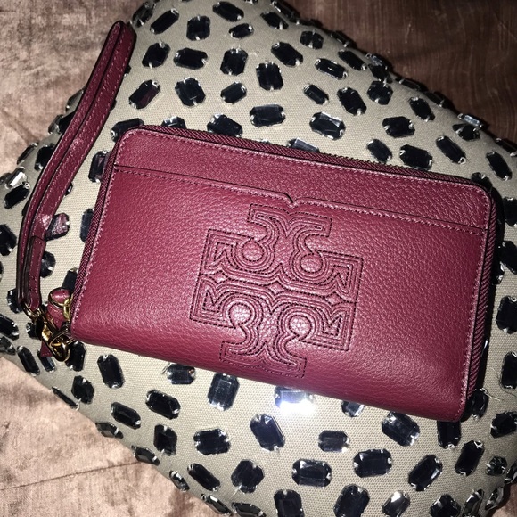 Tory Burch Handbags - Burgundy Tory Burch wallet/phone holder wristlet